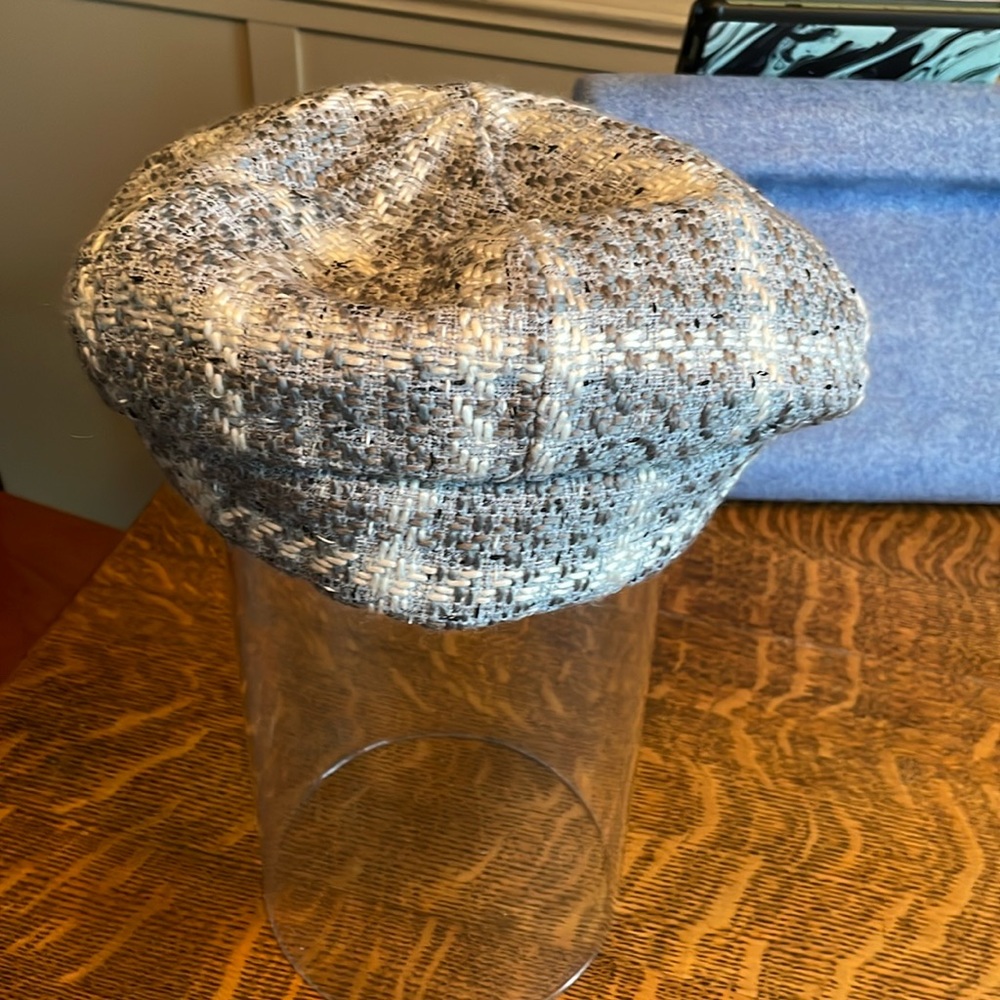 Gray and light blue tweed hat.